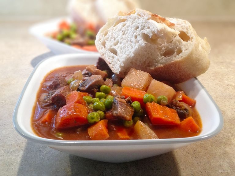 Classic beef stew with potatoes is an excellent cold weather comfort food. This easy beef stew recipe will warm your bones and fill your belly! | Tiny Kitchen Cuisine | http://tiny.kitchen