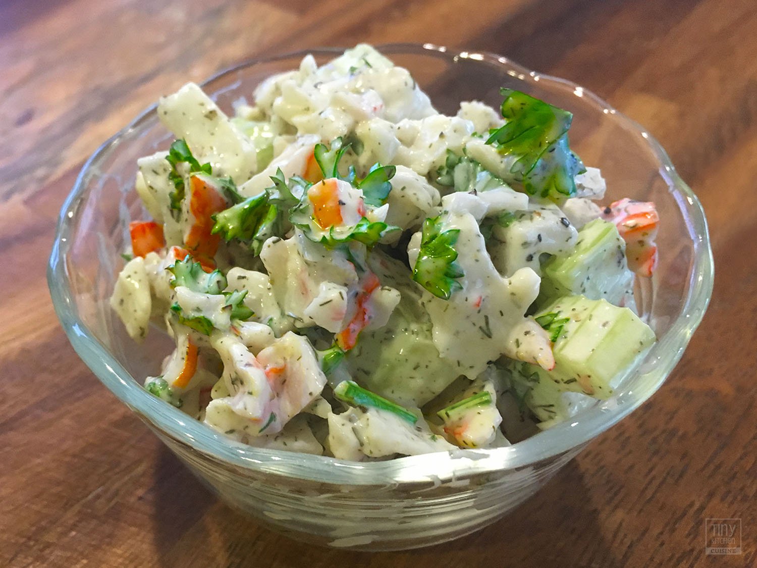 This easy Imitation Crab Salad recipe is a tasty seafood salad that is low in calories and packs a nice crunch. | Tiny Kitchen Cuisine | http://tiny.kitchen