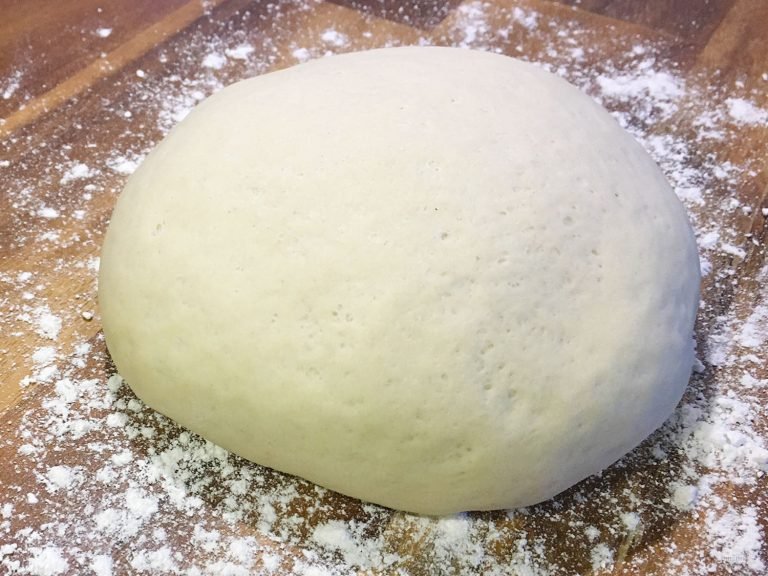 Learn to make fresh pizza dough from scratch with this life-changing recipe. It's the main ingredient for a great pizza, calzones, garlic knots, and a number of other delicious recipes. | Tiny Kitchen Cuisine | http://tiny.kitchen