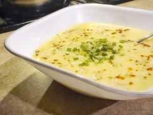 A vegetarian soup recipe that is filling! Cook up this easy potato soup recipe and you'll be eating creamy potato cheese soup in less than an hour! | Tiny Kitchen Cuisine | http://tiny.kitchen