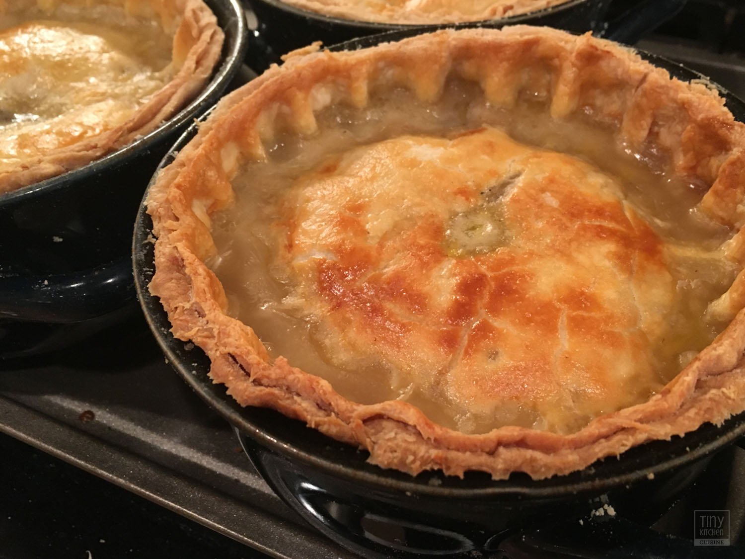 This vegetable pot pie is the ultimate vegetarian comfort food recipe! Enjoy this homemade vegetable stew encased in two layers of crispy, flaky, golden brown all-butter pie crusts. | Tiny Kitchen Cuisine | https://tiny.kitchen