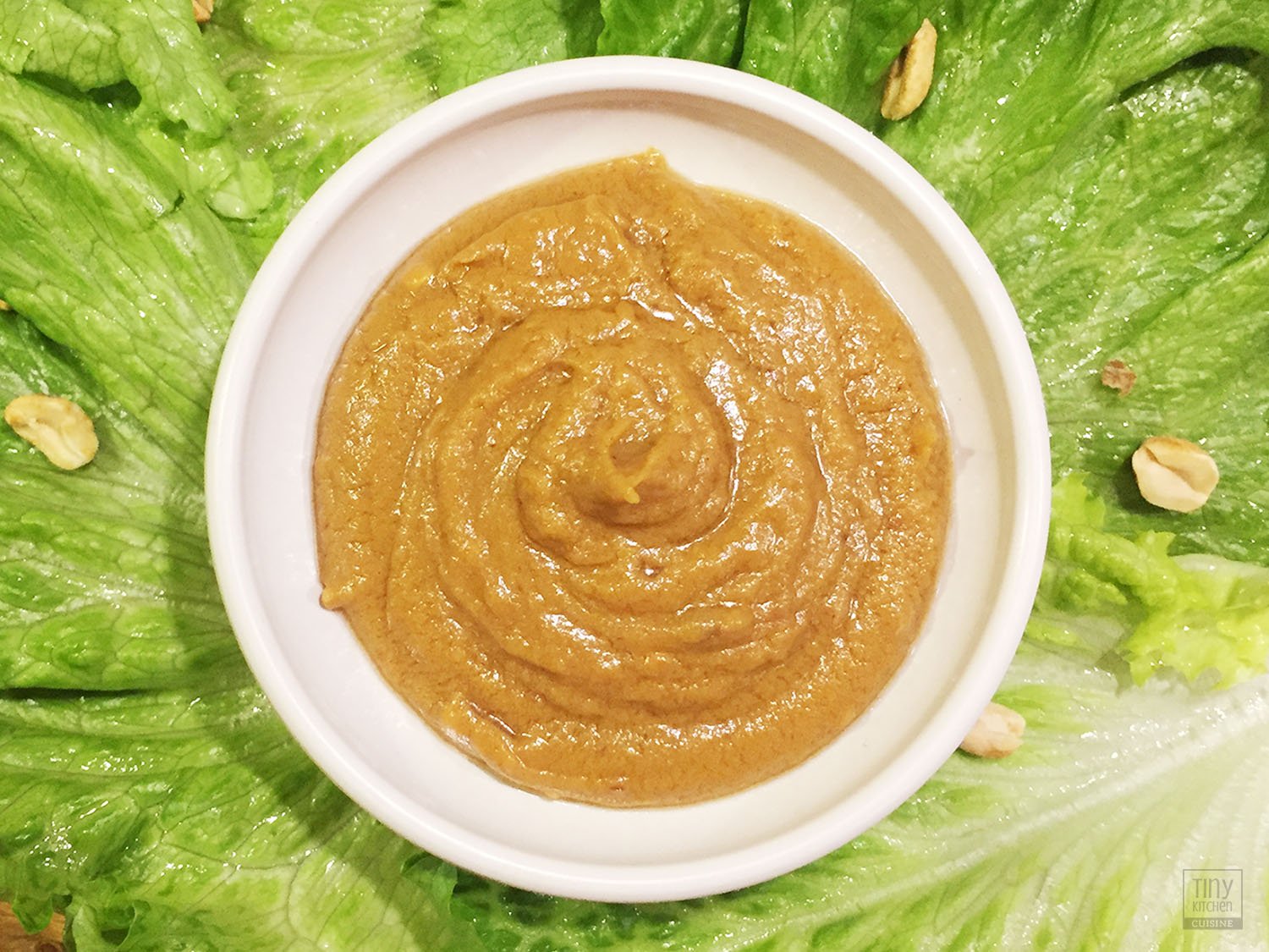 Nutty! Tangy! Spicy! This peanut dipping sauce is made in less than 5 minutes and works as an excellent dip for spring rolls or as a delicious dressing. | https://tiny.kitchen/ | #peanut #sauce #dip #dressing